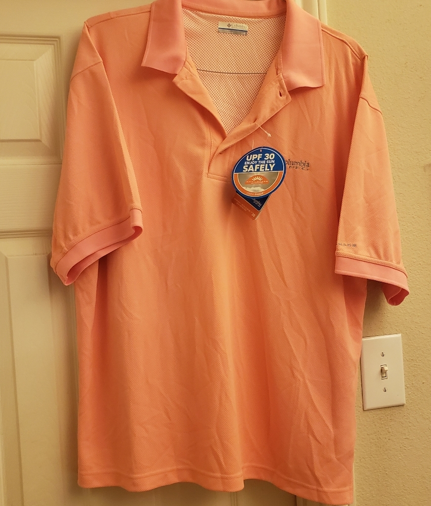 Columbia Omni Shade salmon colored polo shirt